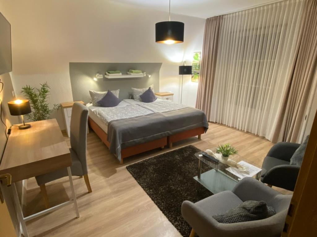 Postel nebo postele na pokoji v ubytování Wilsmann Apartmentvermietung