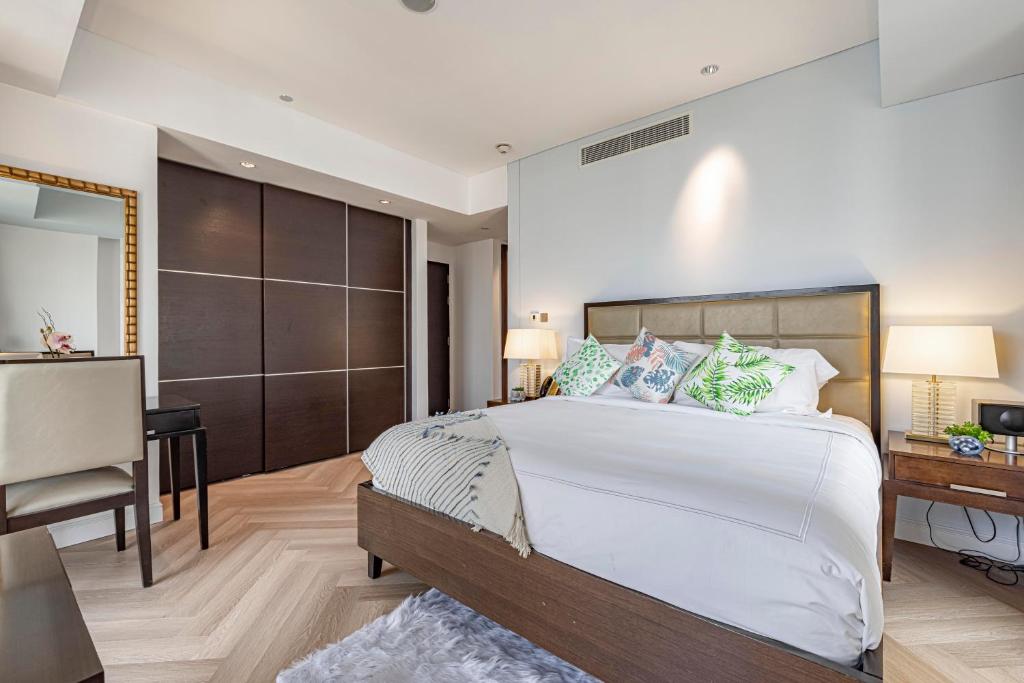 Postel nebo postele na pokoji v ubytování Daniels 1BR at JW Marriott with Dubai Marina View