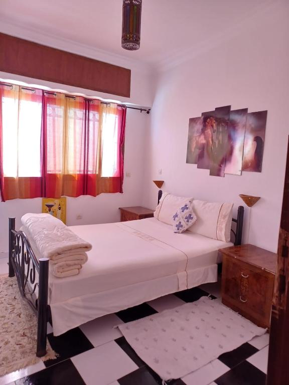 Letto o letti in una camera di Dar Rita