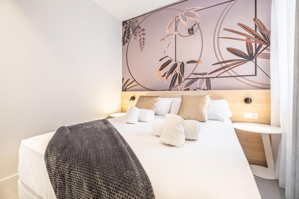 Postel nebo postele na pokoji v ubytování Mara Boutique Apartments