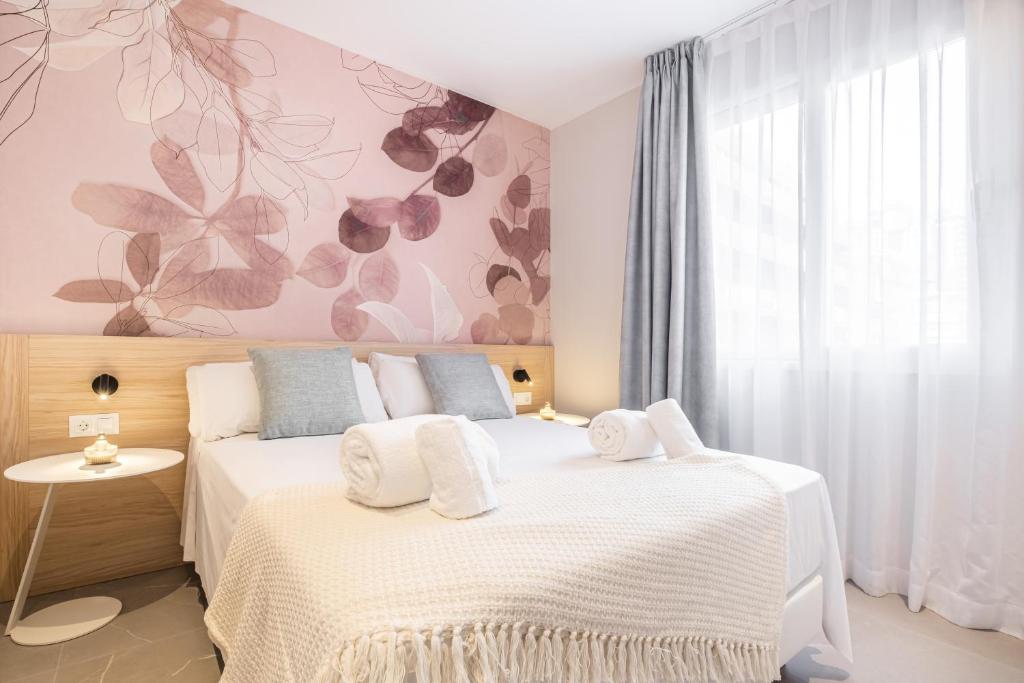 Postel nebo postele na pokoji v ubytování Mara Boutique Apartments
