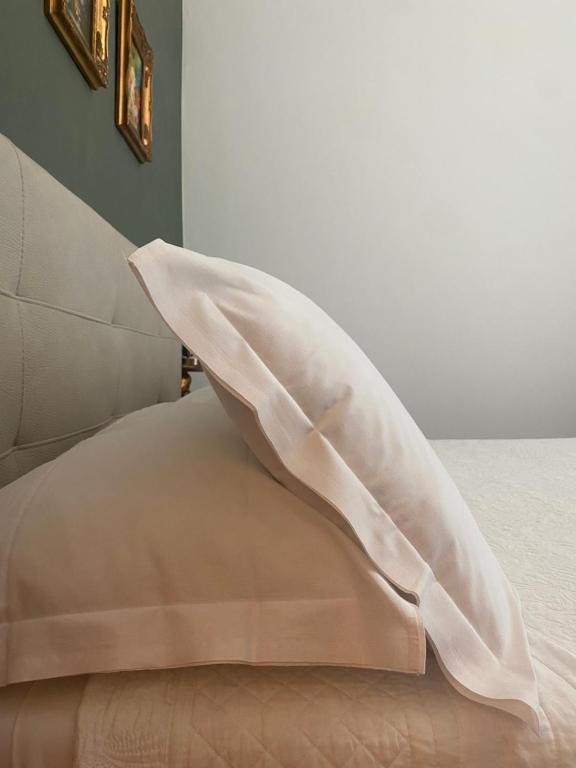 Postel nebo postele na pokoji v ubytování Ortigia Twin Rooms