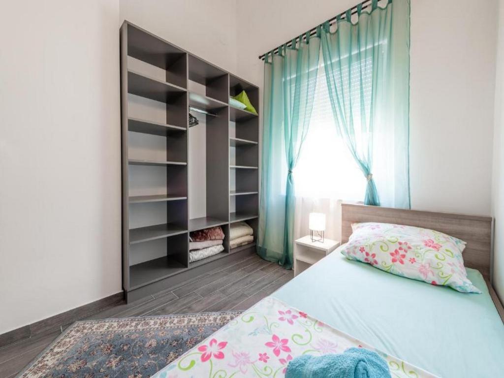 Posteľ alebo postele v izbe v ubytovaní Apartments Villa Soleil