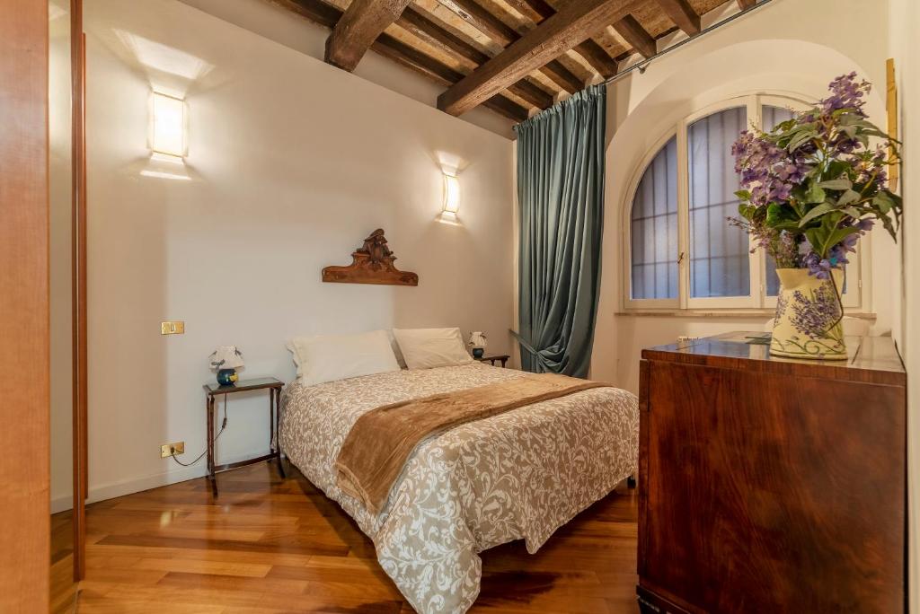 Postel nebo postele na pokoji v ubytování Rione Monti & Cavour Apartment