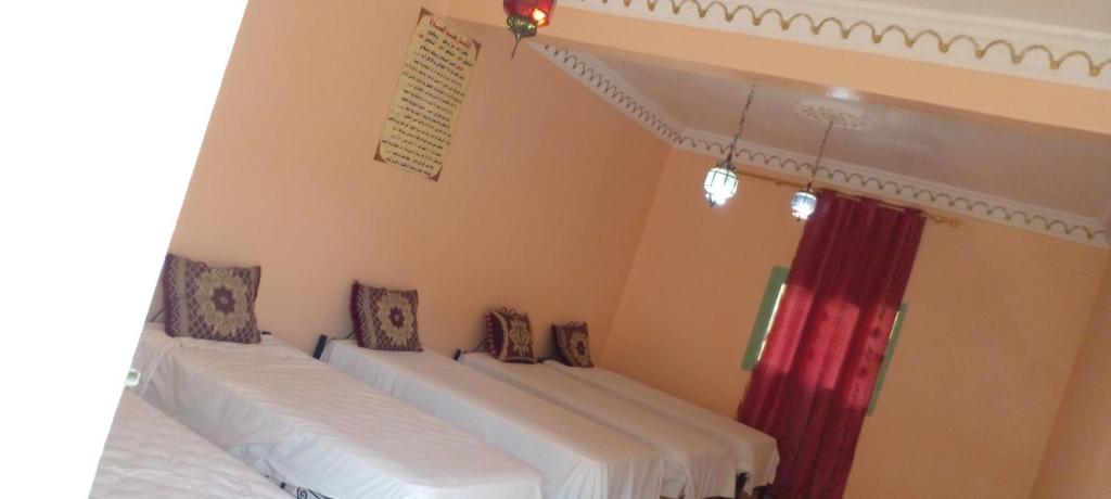 Postel nebo postele na pokoji v ubytování Myhouse Todgha