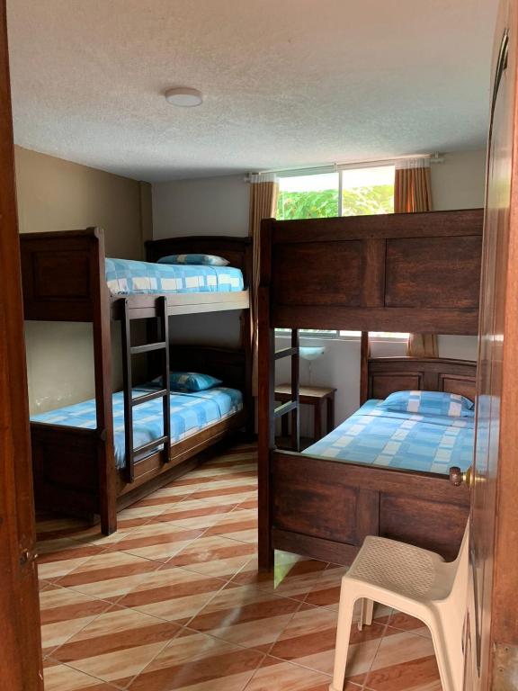 Postel nebo postele na pokoji v ubytování Hotel Kemarios