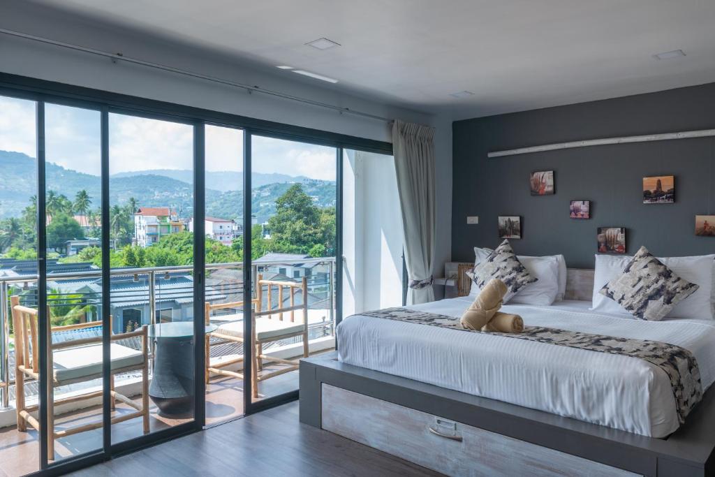 Postel nebo postele na pokoji v ubytování Riviera Beach Hotel