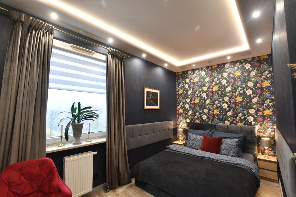 Posteľ alebo postele v izbe v ubytovaní Green Penthouse