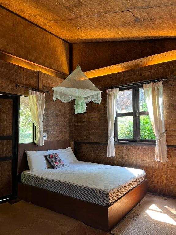 Postel nebo postele na pokoji v ubytování Paipunthong Resort