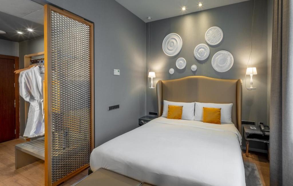 Postel nebo postele na pokoji v ubytování 987 Design Prague Hotel