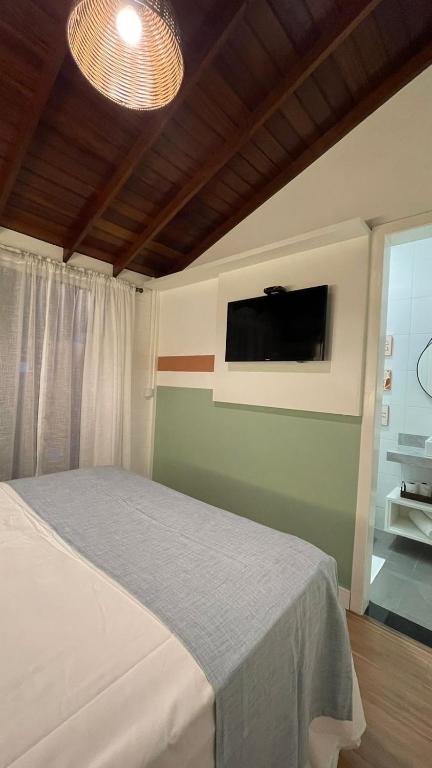 TV a/nebo společenská místnost v ubytování Pousada Casa Mariscal