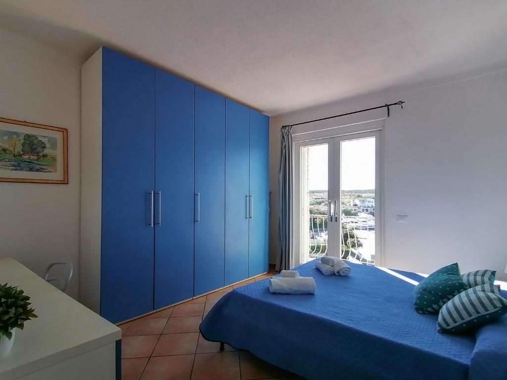 Posteľ alebo postele v izbe v ubytovaní Vigna Marina Apartments