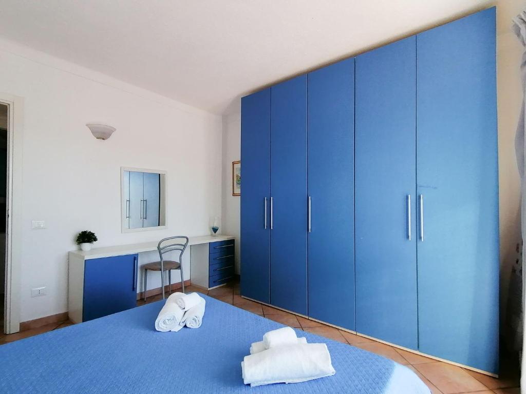 Posteľ alebo postele v izbe v ubytovaní Vigna Marina Apartments