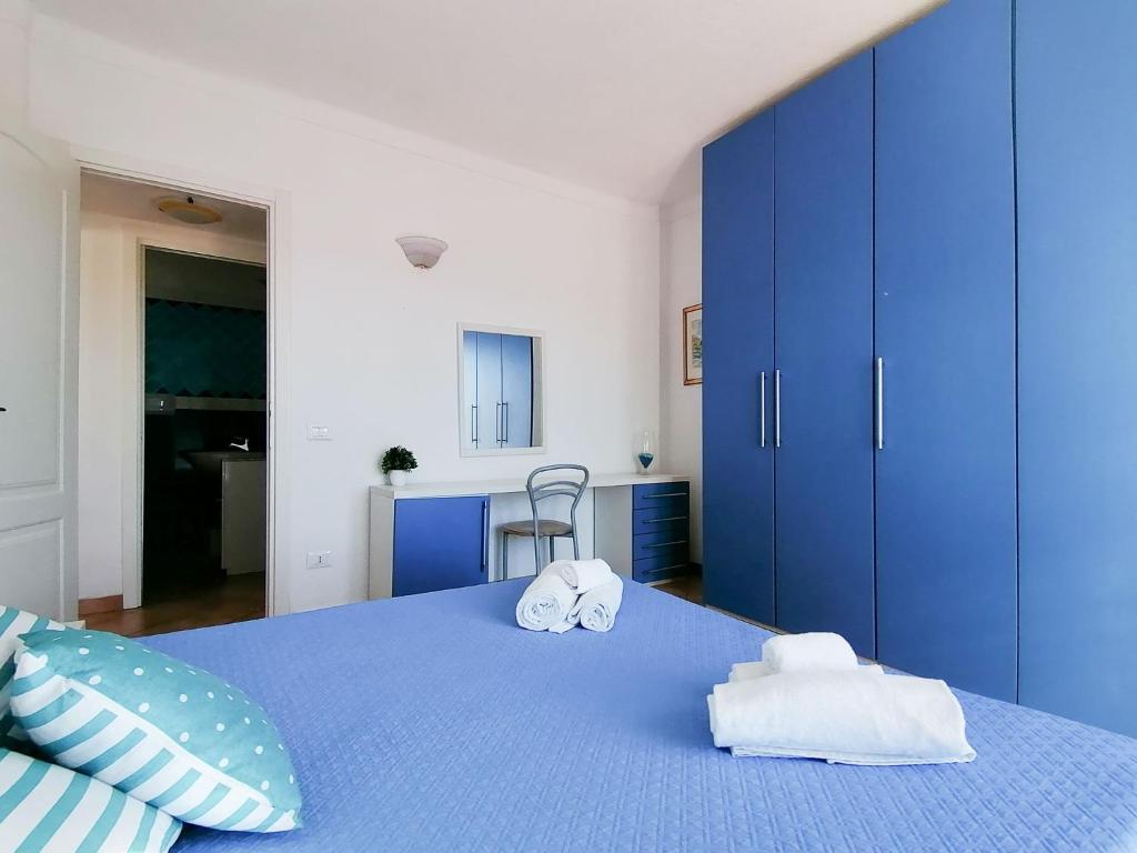 Posteľ alebo postele v izbe v ubytovaní Vigna Marina Apartments
