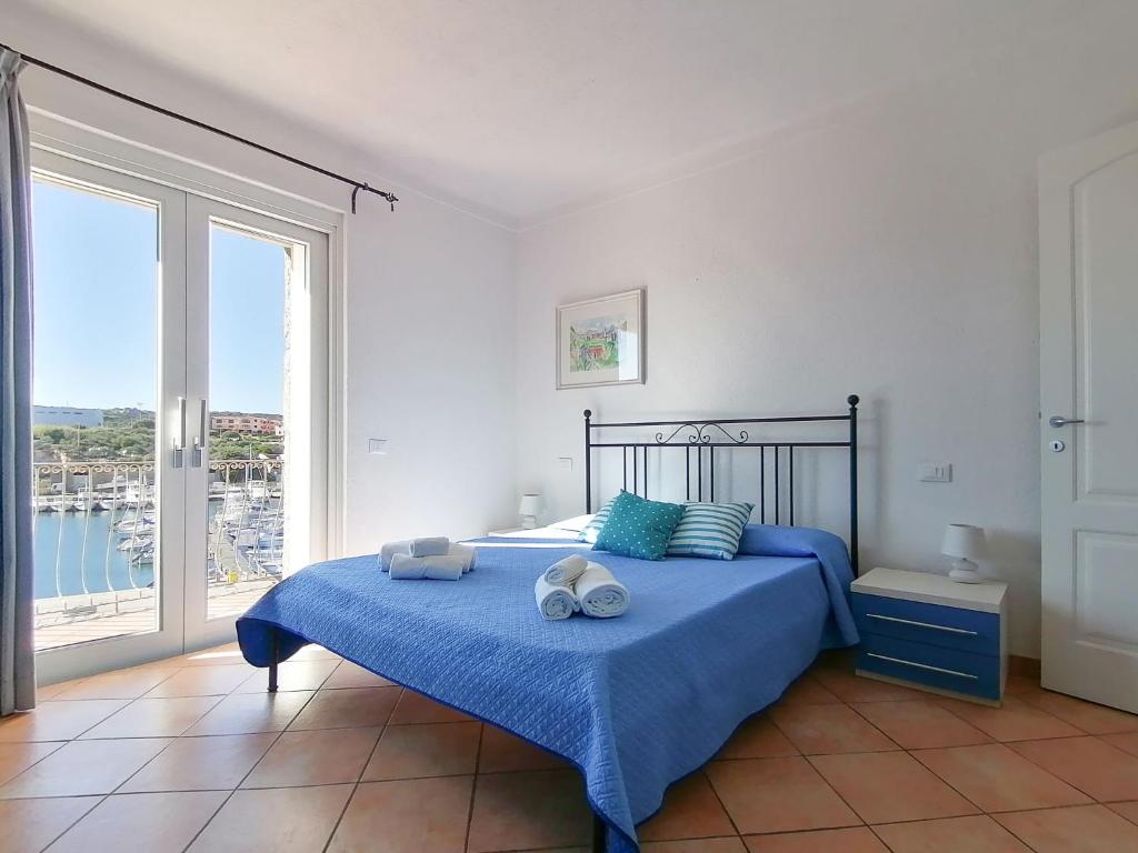 Posteľ alebo postele v izbe v ubytovaní Vigna Marina Apartments