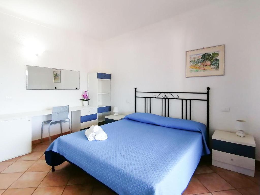 Posteľ alebo postele v izbe v ubytovaní Vigna Marina Apartments
