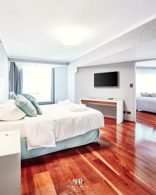 Plaza Real Suites Hotelにあるベッド
