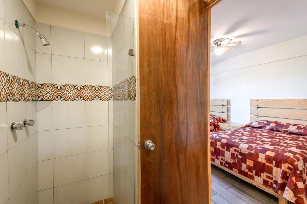 Postel nebo postele na pokoji v ubytování Hotel Meson de Sara