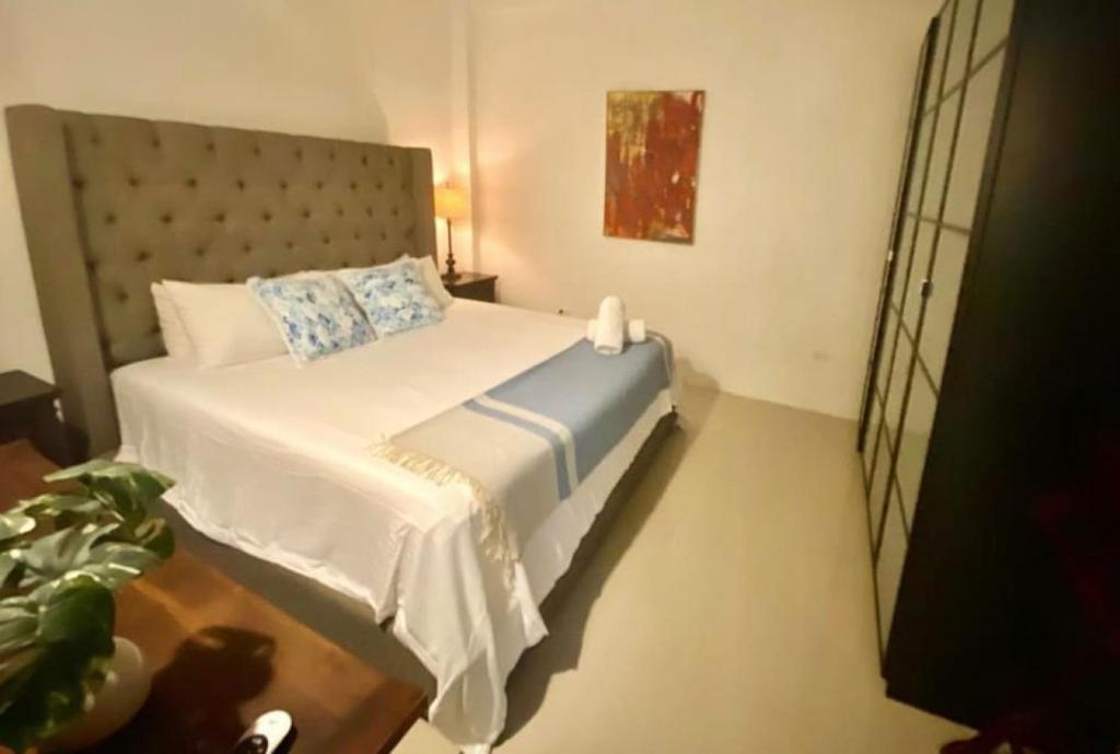Postel nebo postele na pokoji v ubytování KASA The Lofts 302