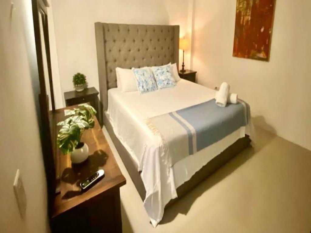 Postel nebo postele na pokoji v ubytování KASA The Lofts 302