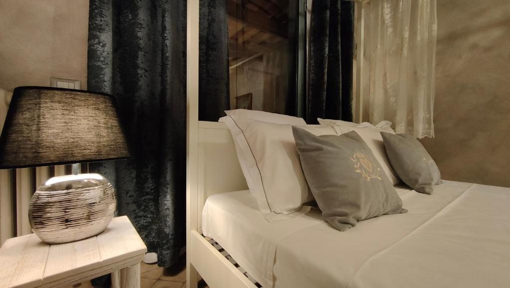 A bed or beds in a room at Podere Le Vedute