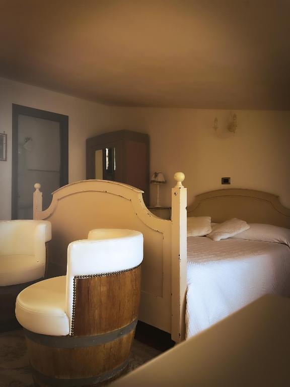 Postel nebo postele na pokoji v ubytování B&B Nero Buono