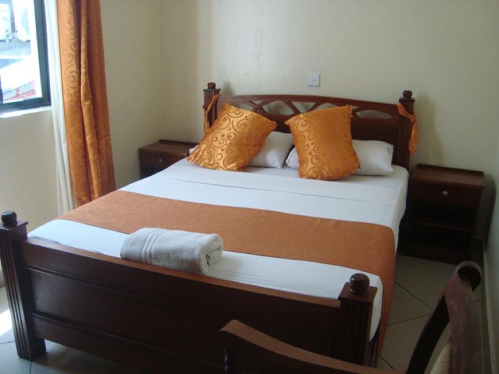 Postel nebo postele na pokoji v ubytování Regency Park Hotel