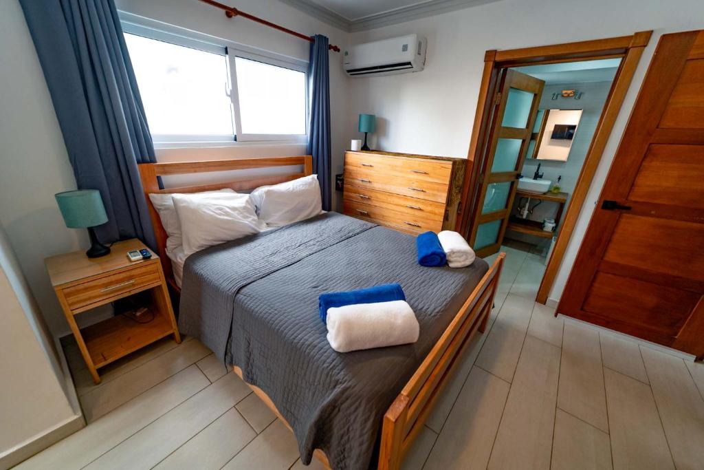 Postel nebo postele na pokoji v ubytování Studio Beachfront Kite Beach