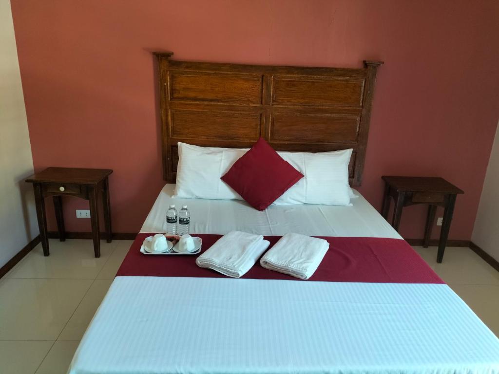 Postel nebo postele na pokoji v ubytování Answer hotel