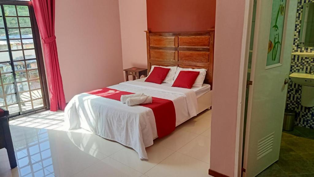 Postel nebo postele na pokoji v ubytování Answer hotel