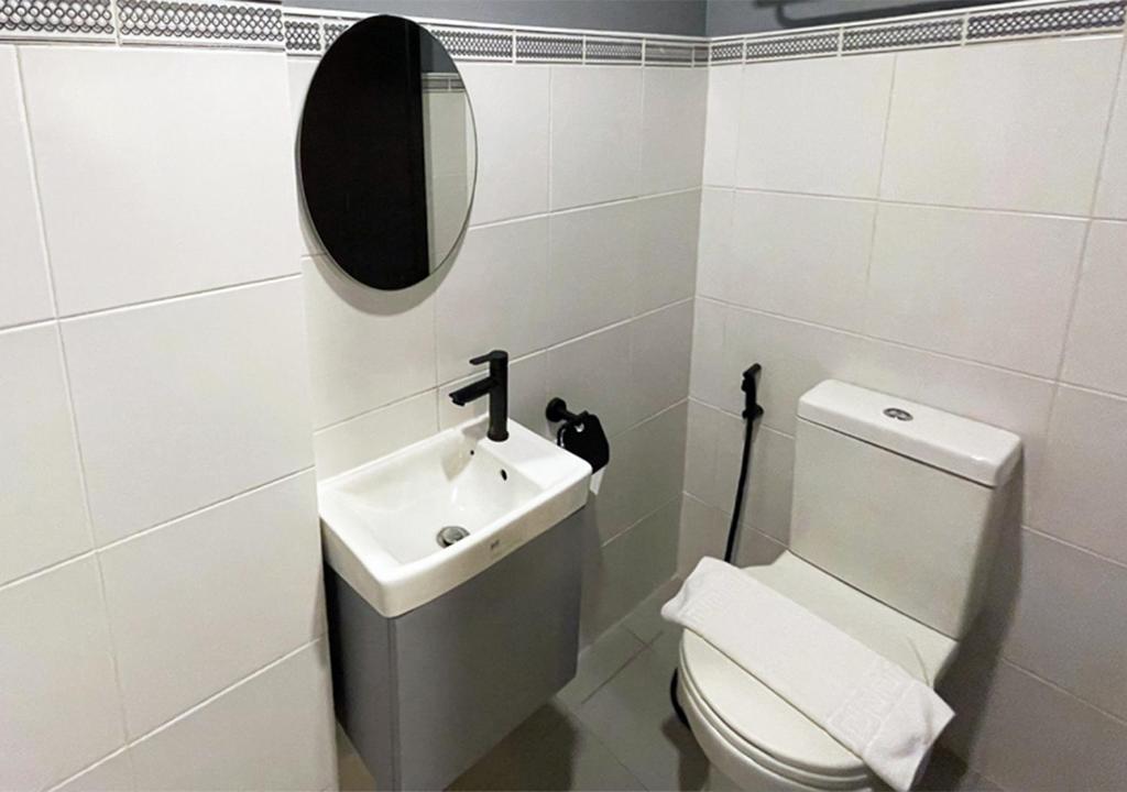 Koupelna v ubytování mySTAY Hotel BGC North