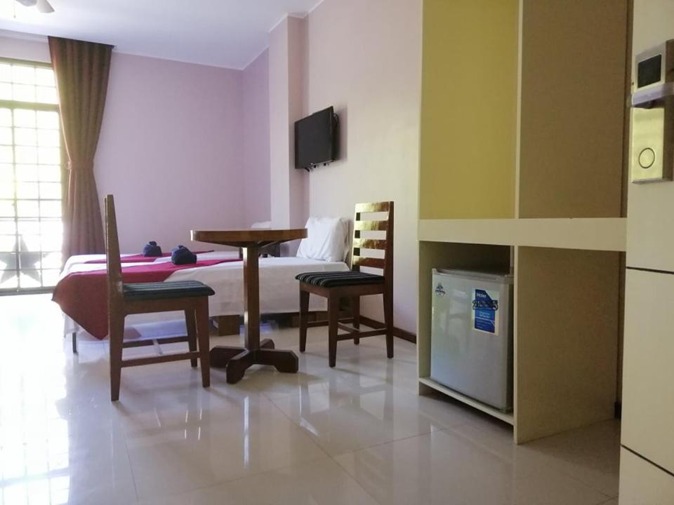 TV a/nebo společenská místnost v ubytování Answer hotel