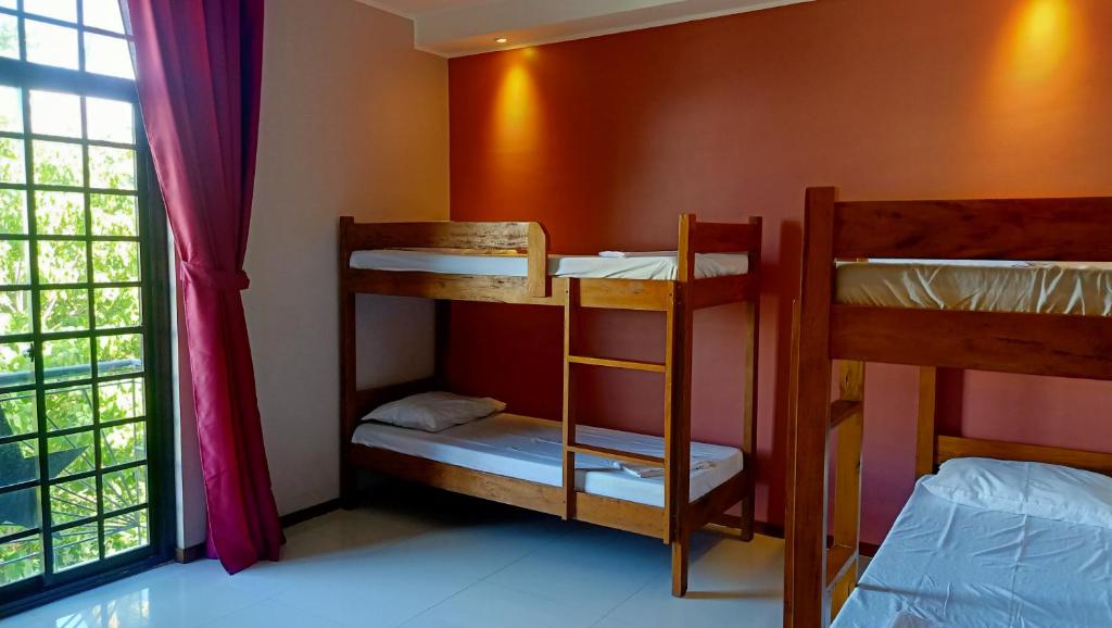 Postel nebo postele na pokoji v ubytování Answer hotel