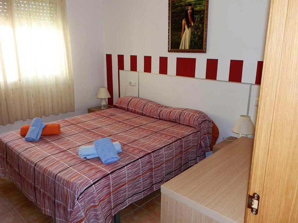 Posteľ alebo postele v izbe v ubytovaní Casa con piscina privada, cerca del mar, wifi gratis, aire acondicionado opcional, admite mascotas - ES-184-3