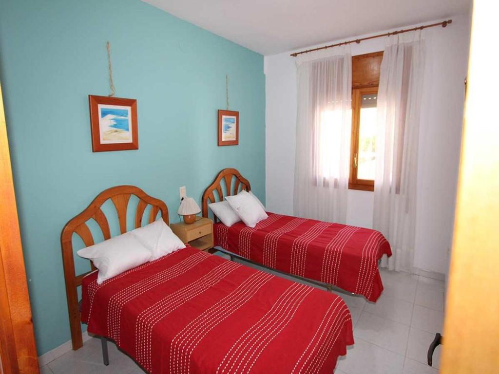 Postel nebo postele na pokoji v ubytování Vacaciones perfectas cerca del mar: piscina privada, mascotas bienvenidas y playa para perros. - ES-184-21