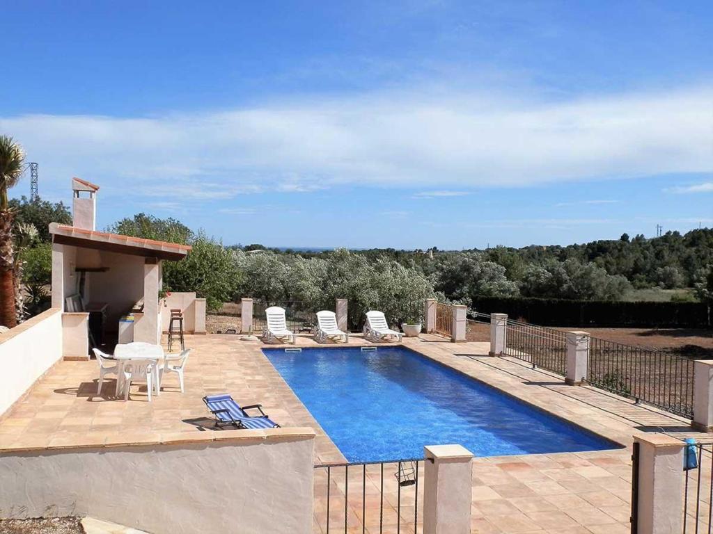 Bazén v ubytovaní Casa cerca del mar con piscina privada, wifi, aire acondicionado opcional y mascotas bienvenidas - ES-184-23 alebo v jeho blízkosti