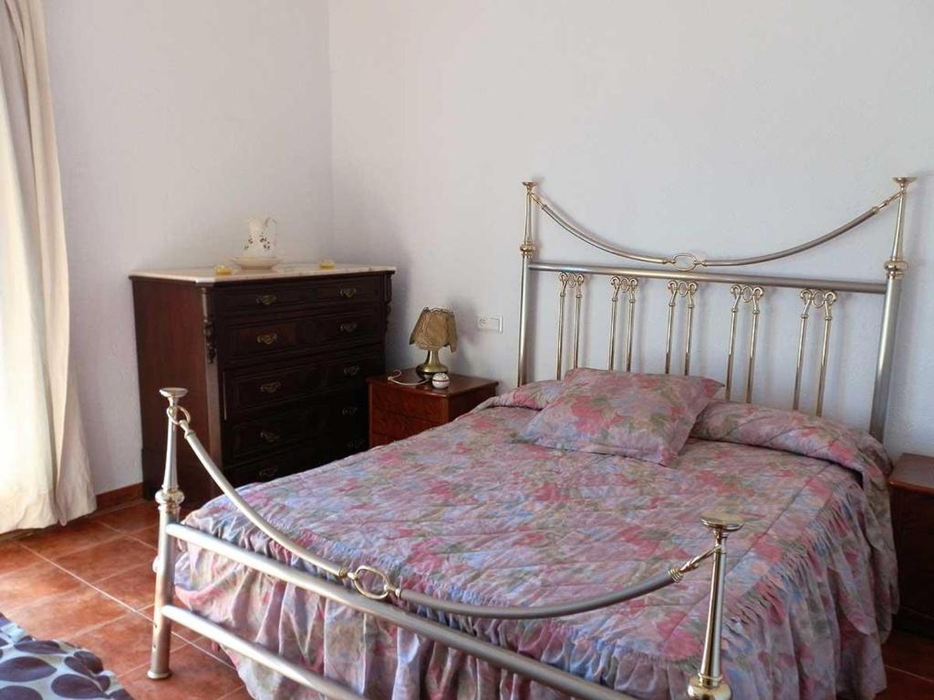 Posteľ alebo postele v izbe v ubytovaní Casa cerca del mar con piscina privada, wifi, aire acondicionado opcional y mascotas bienvenidas - ES-184-23
