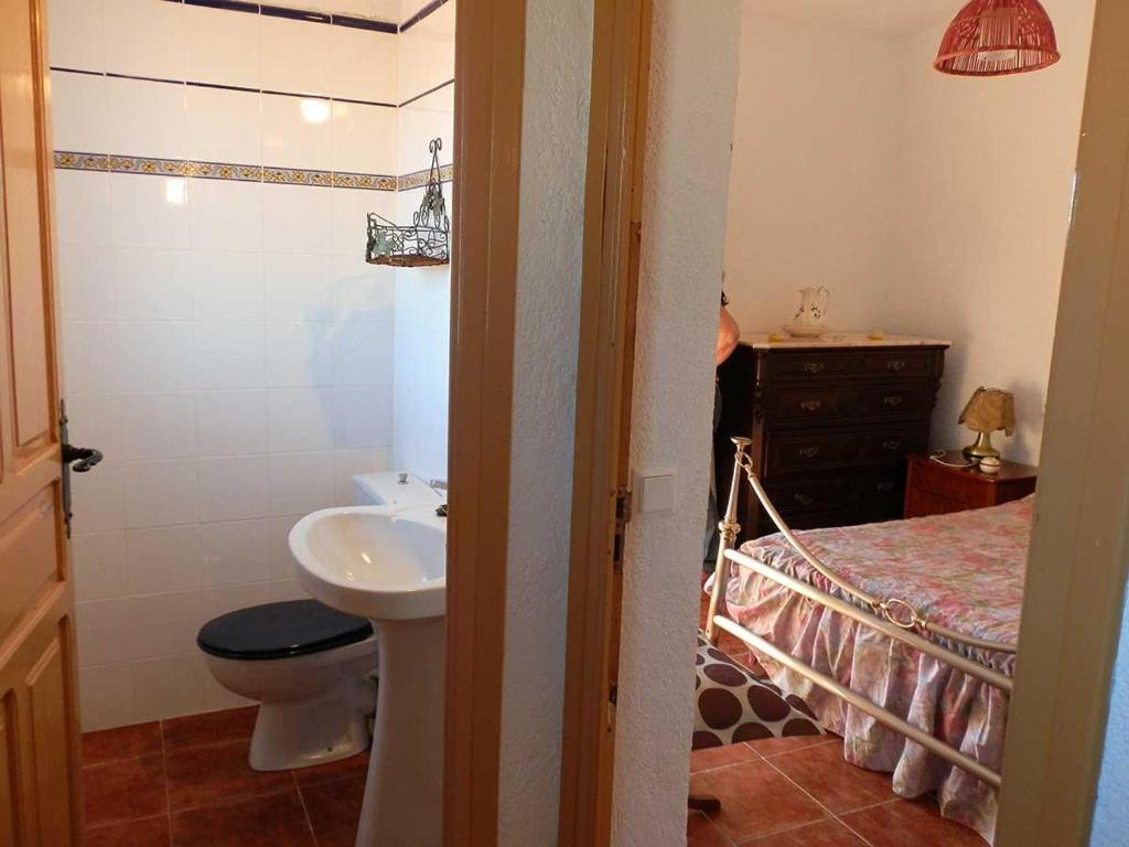 Posteľ alebo postele v izbe v ubytovaní Casa cerca del mar con piscina privada, wifi, aire acondicionado opcional y mascotas bienvenidas - ES-184-23