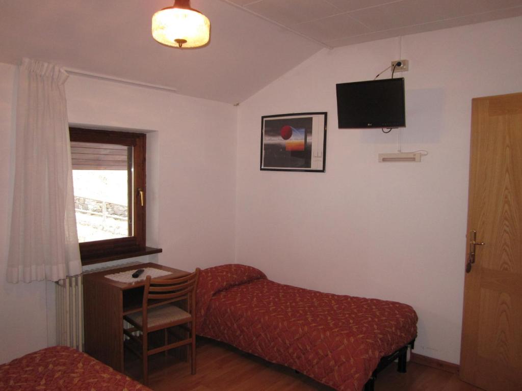 TV a/nebo společenská místnost v ubytování Albergo Valgranda