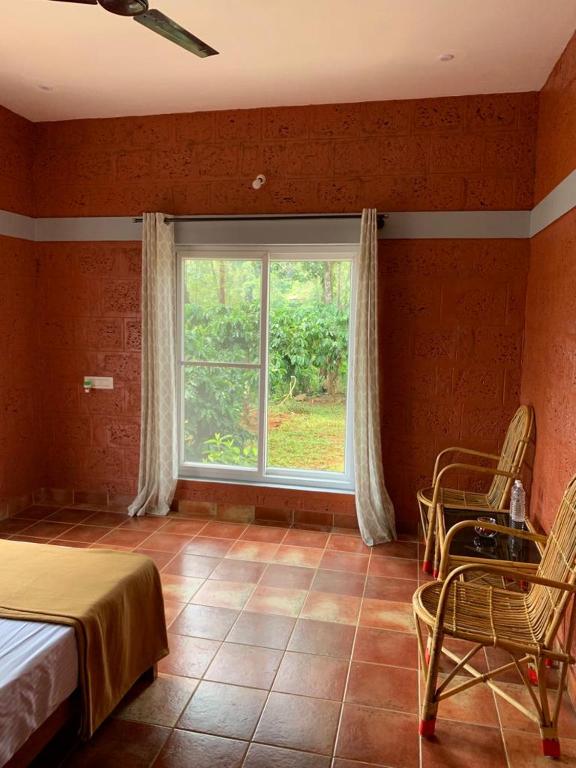 Postel nebo postele na pokoji v ubytování FernHills Homestay