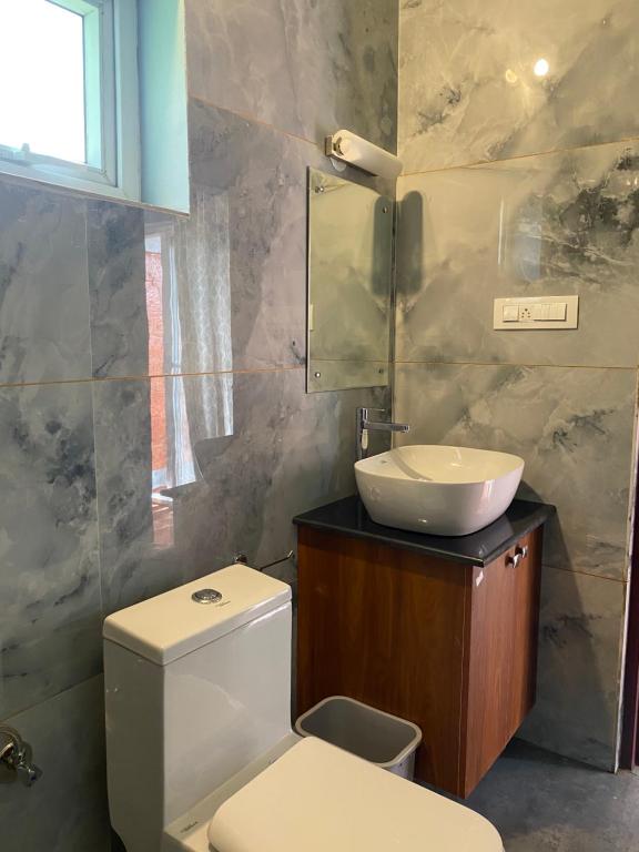 Koupelna v ubytování FernHills Homestay