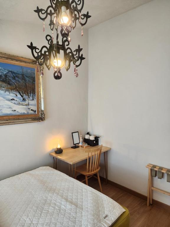 Postel nebo postele na pokoji v ubytování Tong Stay