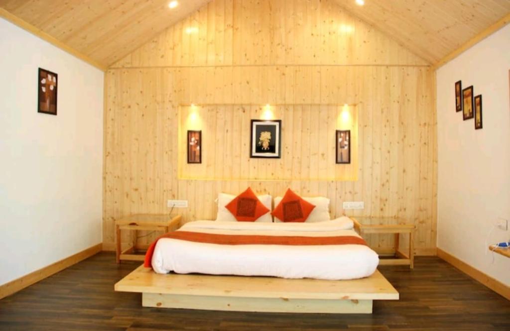 Un pat sau paturi într-o cameră la Hotel Dream Land