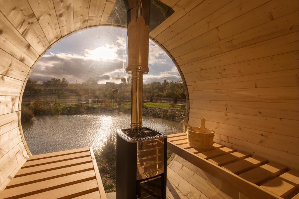 an inside view of a sauna with a window at Green Resort Bran in Bran