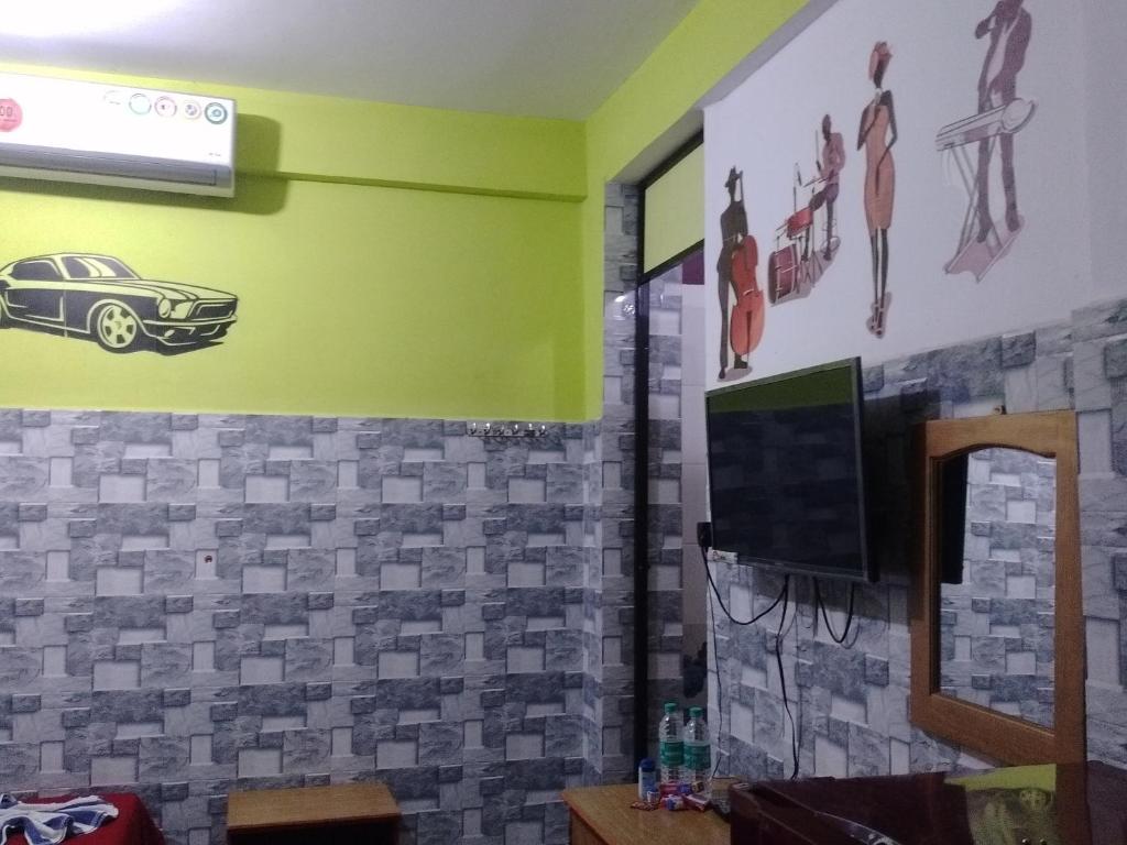 TV a/nebo společenská místnost v ubytování Baga F Leisure Stay Guest House