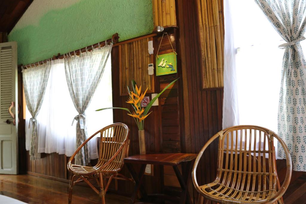 Posezení v ubytování Vamxang Rustic Home