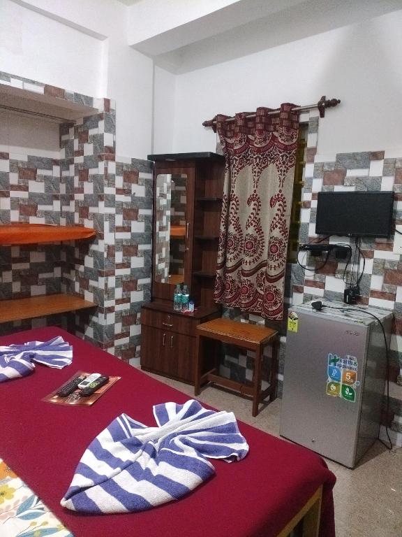TV a/nebo společenská místnost v ubytování Baga F Leisure Stay Guest House