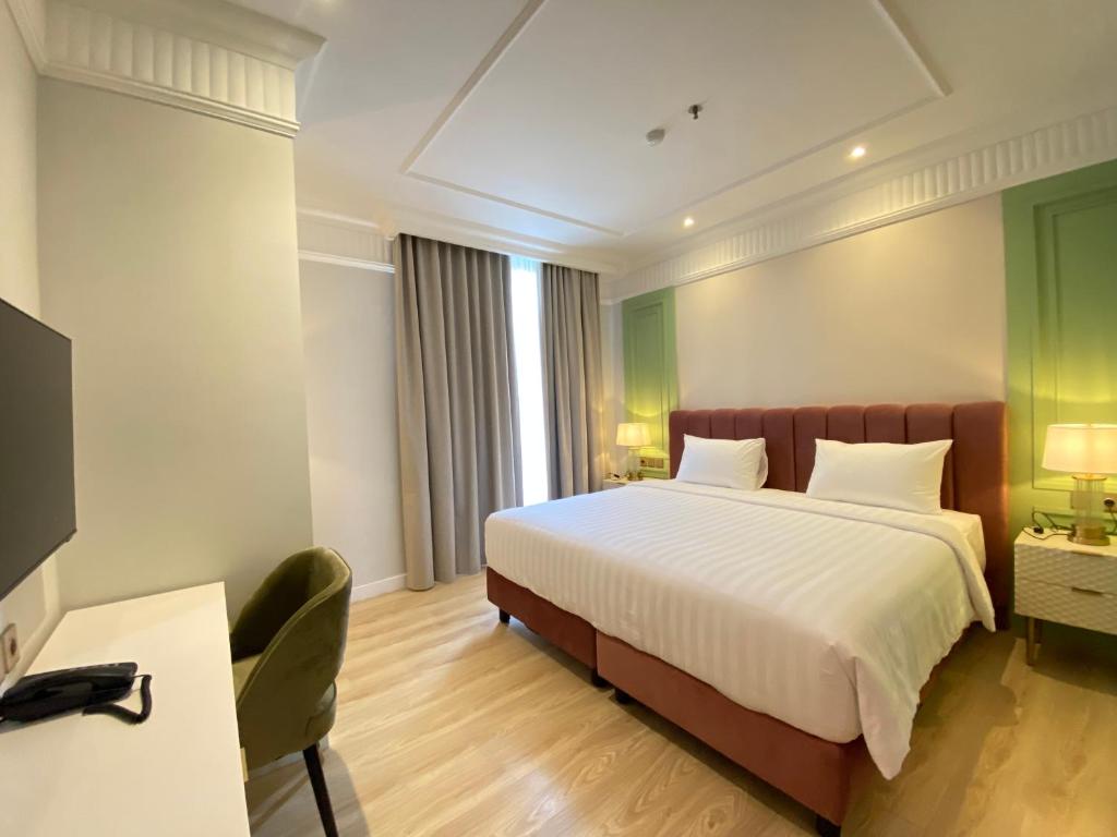 TV a/nebo společenská místnost v ubytování Maia Hotel Jakarta