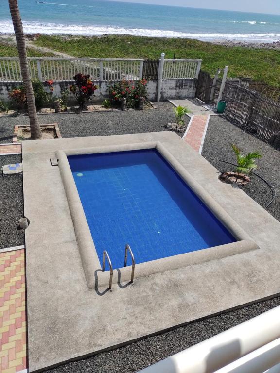 Bazén v ubytování Hostal Cabañas Vistamar nebo v jeho okolí