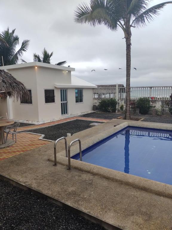 Bazén v ubytování Hostal Cabañas Vistamar nebo v jeho okolí